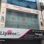 Custom ACP Building Signage with Vinyl Branding